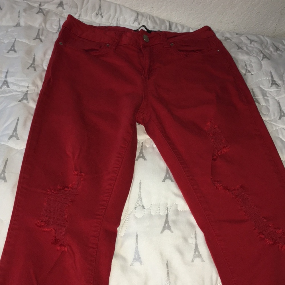 Red ripped jeans